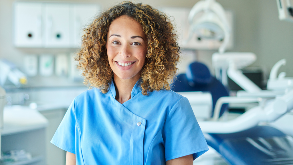 a woman in a blue scrubs